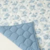 Det forgyllede fugle-leketeppet «Spring Toile»