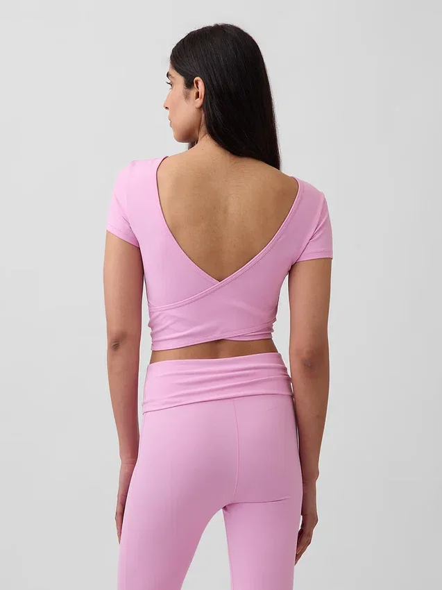 GapFit Smooth vendbar crop-top med kryssrygg