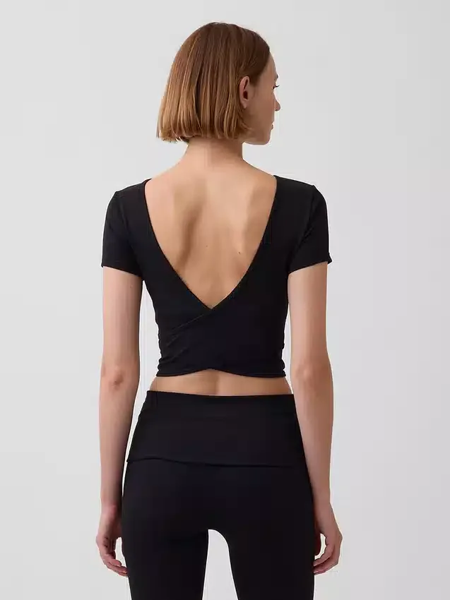 GapFit Smooth vendbar crop-top med kryssrygg