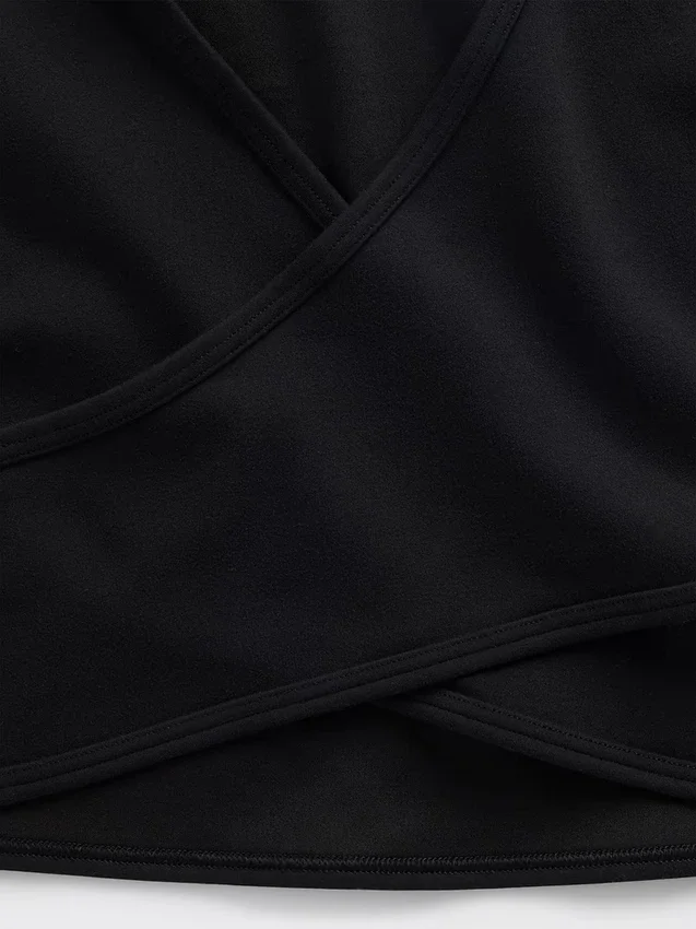 GapFit Smooth vendbar crop-top med kryssrygg