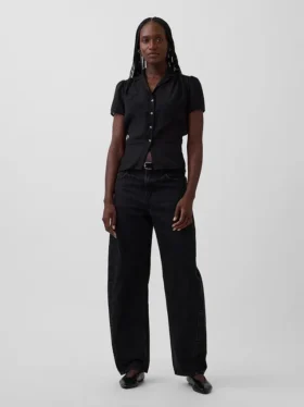 Gjennomsiktig peplum-top med knapper foran