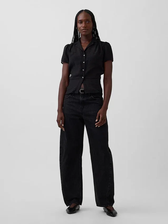Gjennomsiktig peplum-top med knapper foran