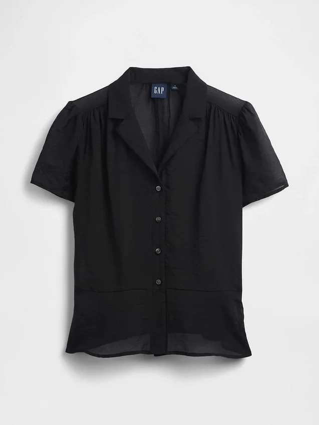 Gjennomsiktig peplum-top med knapper foran