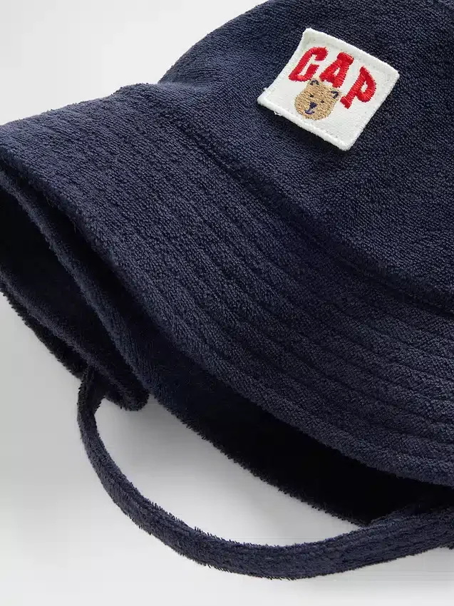 Hatt i frotté med Brannan Bear-logo for Baby og Småbarn