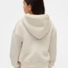 Hettegenser med grafisk logo og sherpa-fôr for barn