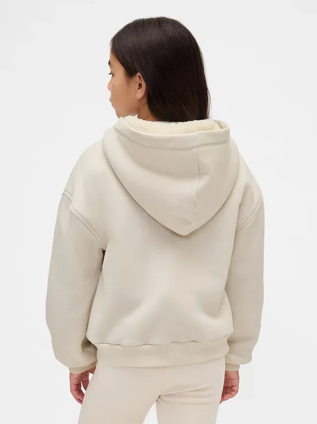 Hettegenser med grafisk logo og sherpa-fôr for barn