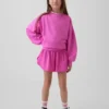 Hurtigtørkende løpeshorts med sommerfuglkant for barn