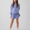 Hurtigtørkende løpeshorts med sommerfuglkant for barn
