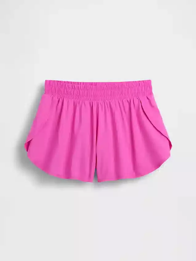 Hurtigtørkende løpeshorts med sommerfuglkant for barn