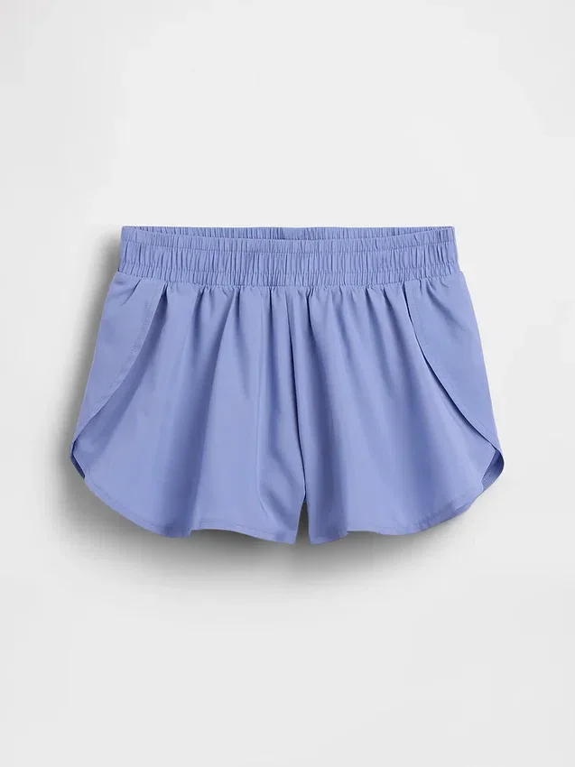 Hurtigtørkende løpeshorts med sommerfuglkant for barn