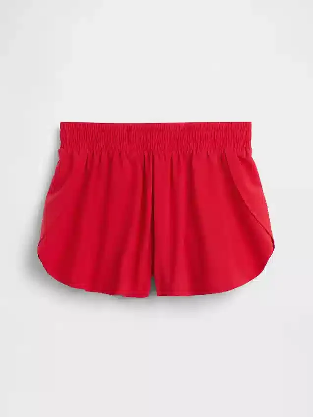 Hurtigtørkende løpeshorts med sommerfuglkant for barn