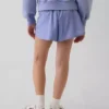 Hurtigtørkende løpeshorts med sommerfuglkant for barn