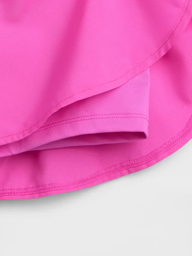 Hurtigtørkende løpeshorts med sommerfuglkant for barn