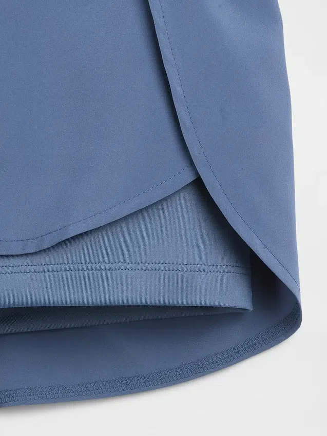 Hurtigtørkende løpeshorts med sommerfuglkant for barn