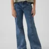 Jeans for barn med lav midje, sømmer og avslappet flare-passform