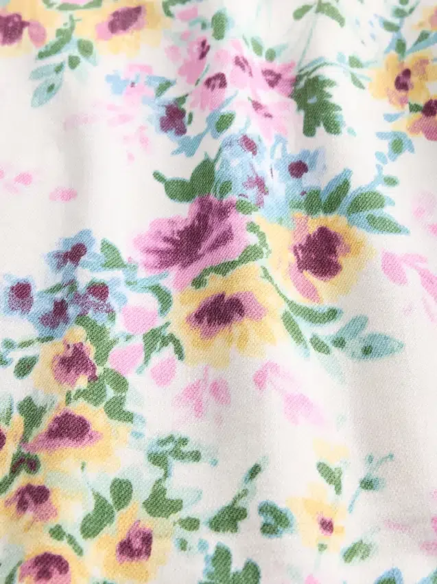 Jeans med høy midje og blomstermønster