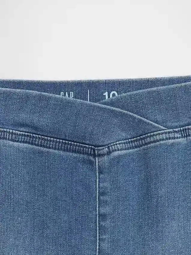 Jeans med høy midje og kryssende ben for barn