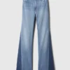 Jeans med høy midje og lapper i 70-tallsstil