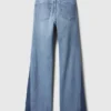 Jeans med høy midje og lapper i 70-tallsstil