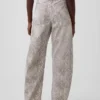 Jeans med høy midje og slangemønster