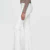 Jeans med høy midje og utvidet ben i 70-tallsstil