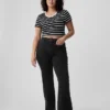 Jeans med høy midje og utvidet ben i 70-tallsstil