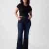 Jeans med høy midje og utvidet ben i 70-tallsstil