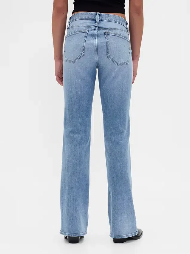Jeans med lav midje, flettede lommer, lang og slank passform