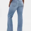 Jeans med lav midje, flettede lommer, lang og slank passform