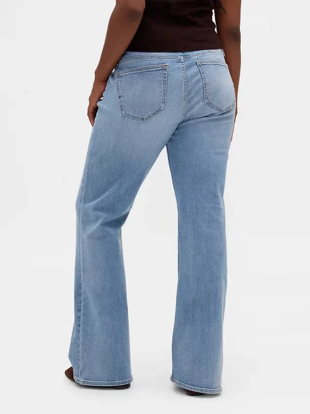 Jeans med lav midje, flettede lommer, lang og slank passform