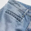 Jeans med lav midje, flettede lommer, lang og slank passform