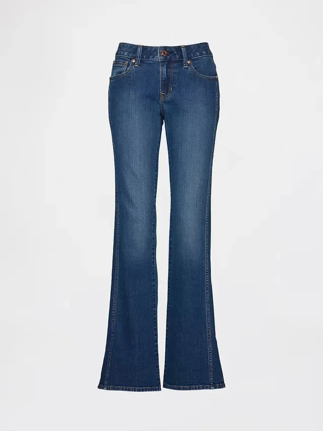 Jeans med lav midje, lang og slank passform og søm i splittet kant