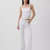 Jeans med lav midje, lang og slank passform og snøring