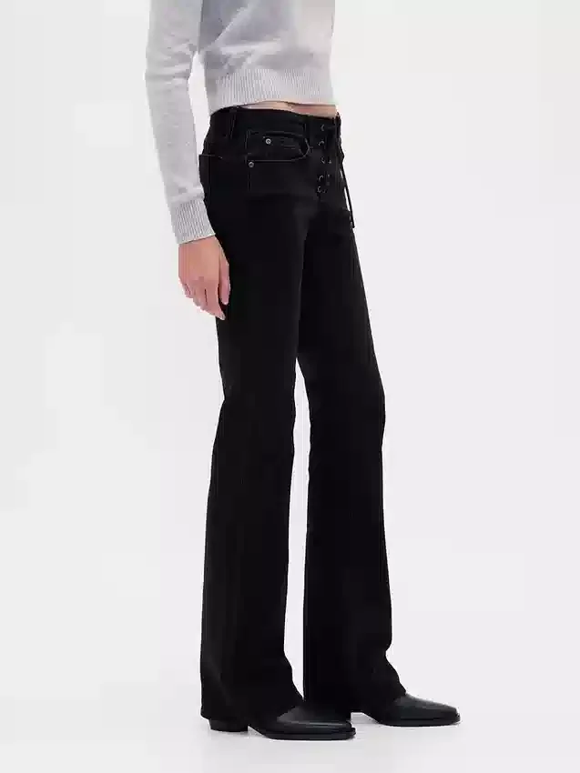 Jeans med lav midje, lang og slank passform og snøring