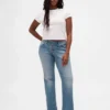 Jeans med lav midje, lang og slank passform og snøring