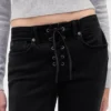 Jeans med lav midje, lang og slank passform og snøring