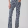 Jeans med lav midje, lang og slank passform og striper