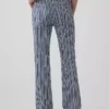 Jeans med lav midje, lang og slank passform og striper