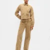 Jeans med lav midje, løs passform og mikrobelte i 90-tallsstil