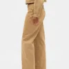 Jeans med lav midje, løs passform og mikrobelte i 90-tallsstil