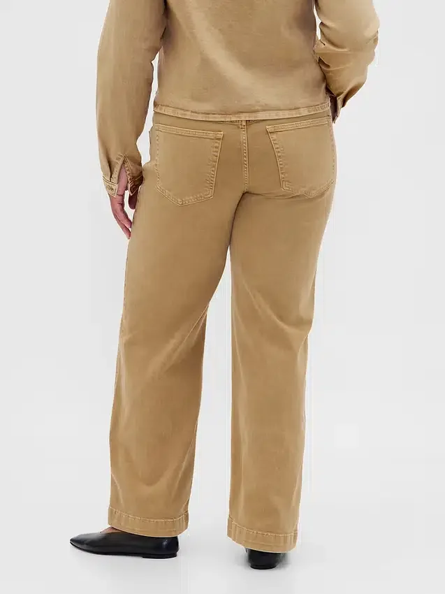 Jeans med lav midje, løs passform og mikrobelte i 90-tallsstil