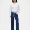 Jeans med lav midje, snøring og løs passform i 90-tallsstil