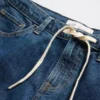 Jeans med lav midje, snøring og løs passform i 90-tallsstil