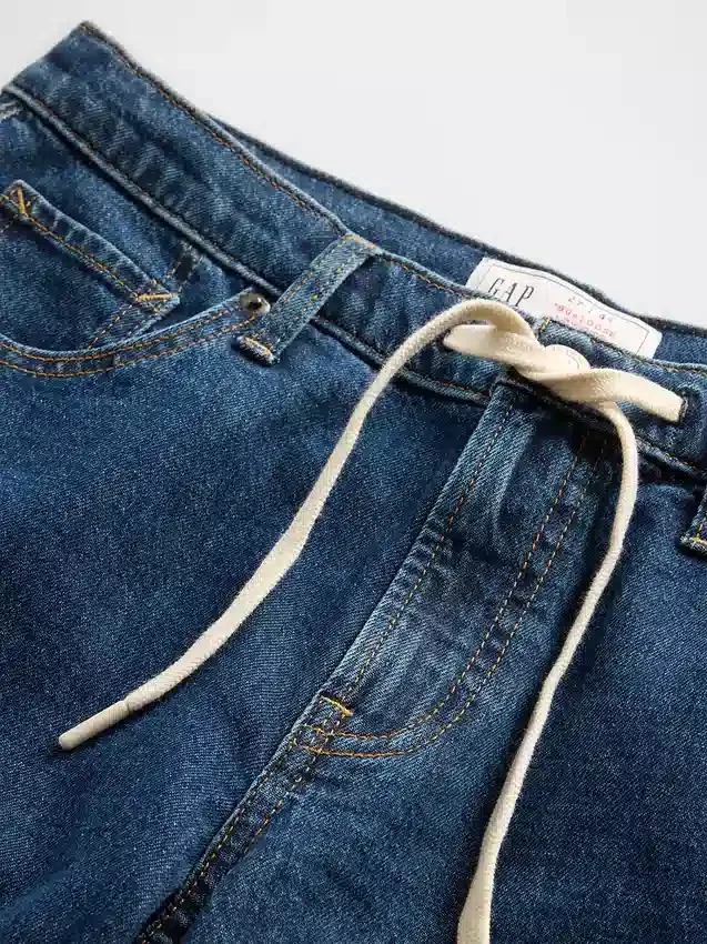 Jeans med lav midje, snøring og løs passform i 90-tallsstil
