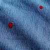 Jeans med middels høy midje, broderi og avslappet, rett passform