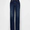 Jeans med middels høy midje og avslappet, rett passform