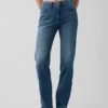 Jeans med middels høy midje, splittet kant og avslappet, rett passform