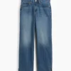 Jeans med middels høy midje, splittet kant og avslappet, rett passform