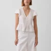Kort peplum-top i blonder og voile