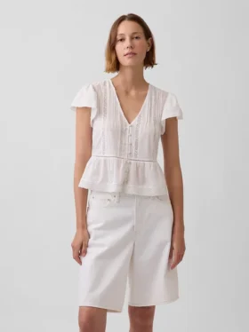 Kort peplum-top i blonder og voile